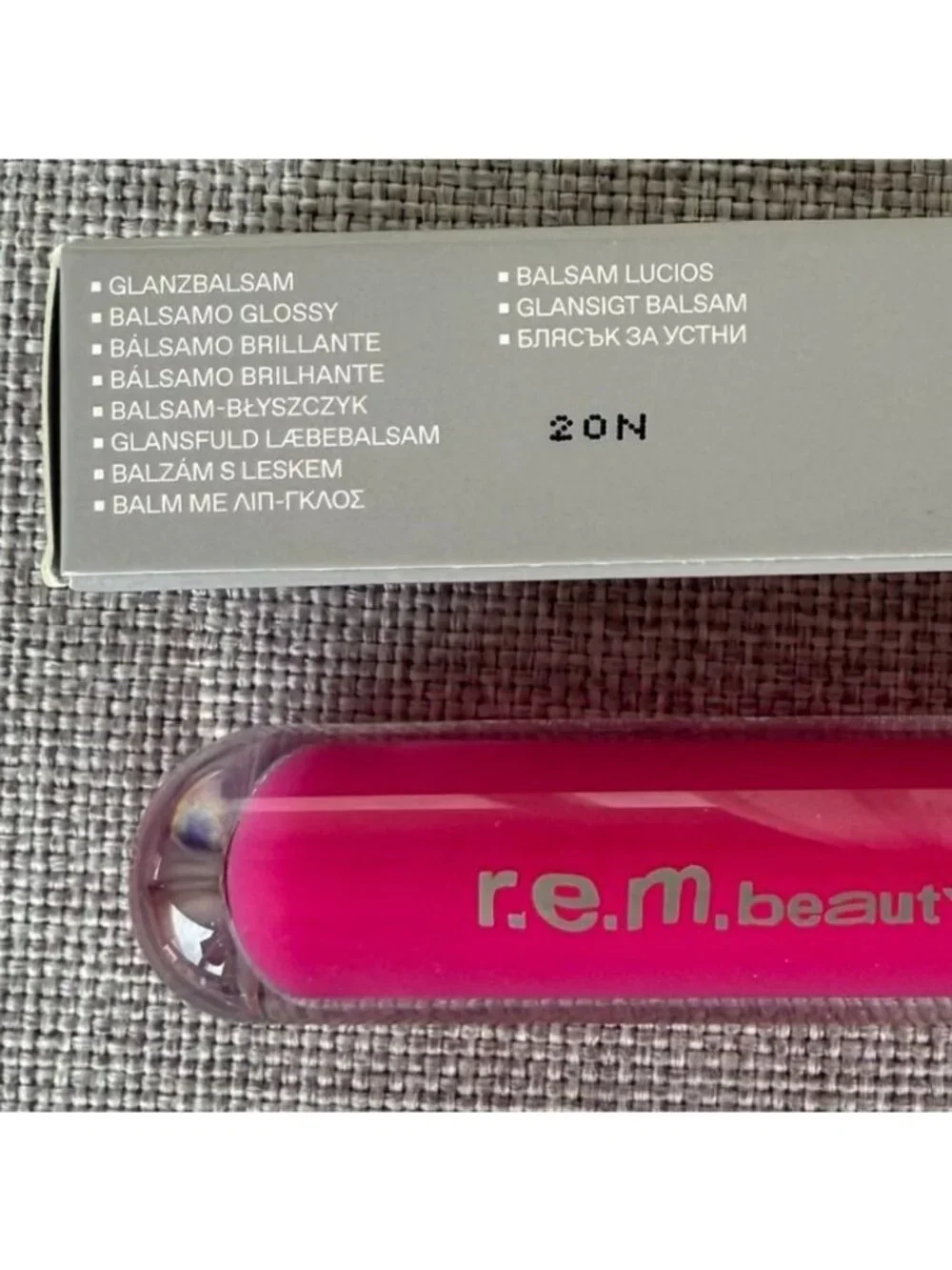 REM Beauty Essential Drip Glossy Lip Balm Strawberry Soda 0.15 oz Ariana Grande